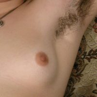 European amateur Gypsy showing off pierced nipples, furry armpits and hairy bush