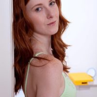 Redhead teen solo girl Linda Sweet modeling nude for tease photo shoot