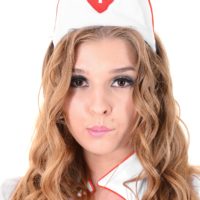 Solo model Alina N works herself free from her naughty nurse unfiorm