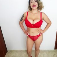Tattooed Latina chick Sofia Santana looses her huge boobs during a POV handjob
