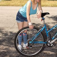 Blonde teen Missy Mae sports full breasts during sex with a boy that fixes her bicycle
