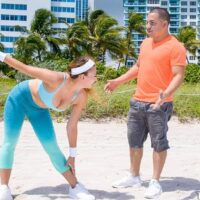 Busty nubile female Ivy Rose gets drilled by her trainer after exercising on a beach