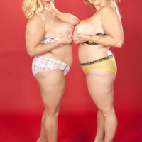 Overweight lesbians Renee Ross and Samantha 38G kiss after going topless